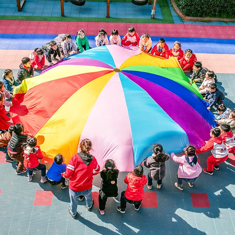 Dia 2m/3m bambino bambino sviluppo sportivo arcobaleno esterno ombrello paracadute giocattolo salto sacco Ballute gioca paracadute 8/16 braccialetto