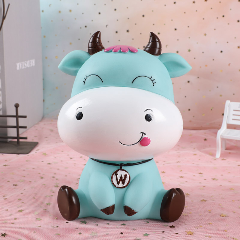 Lovely cartoon cow piggy bank -proof children can save Year of the Ox piggy bank for boys and girls ornaments: Small(blue)squinting
