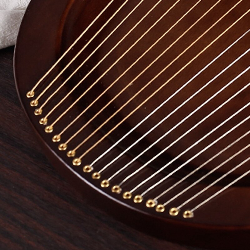 Lyra-klavier, 19- saitiges musikinstrument aus mahagoni, inklusive stimmschlüssel und ersatzsaiten