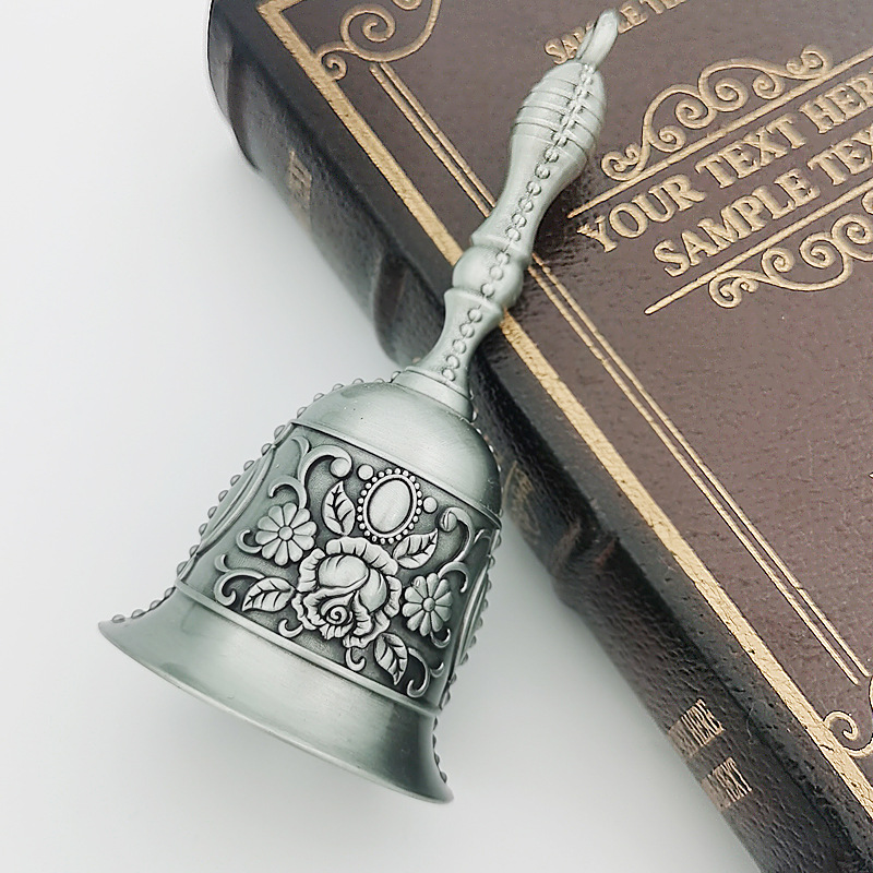 Moderne klar lyd håndklokke bronze metal retro rose kirkeklokke gylden middagsklokke til restaurant bar jingle kirke skole: Lysegrå