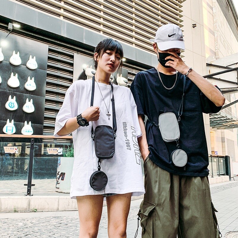 Coole reflecterende schoudertas mobiele telefoon tas mannen en vrouwen draagbare messenger mini kleine borsttas waterdichte sportkleding