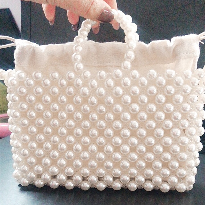 Za pearl armband väska bärbar halm vävd väska pärlstav axelväska crossbody väska