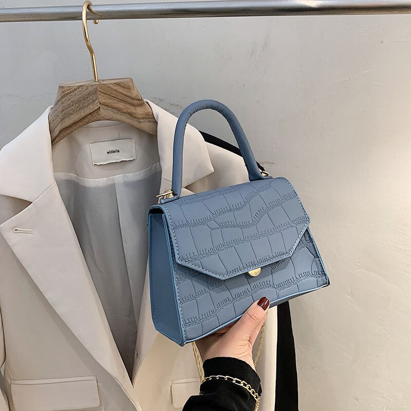 Handtaschen im vintage-stil mit steinmuster, schulterriemen und metallriemen – ideal für frühling und sommer. perfekt für pendler.