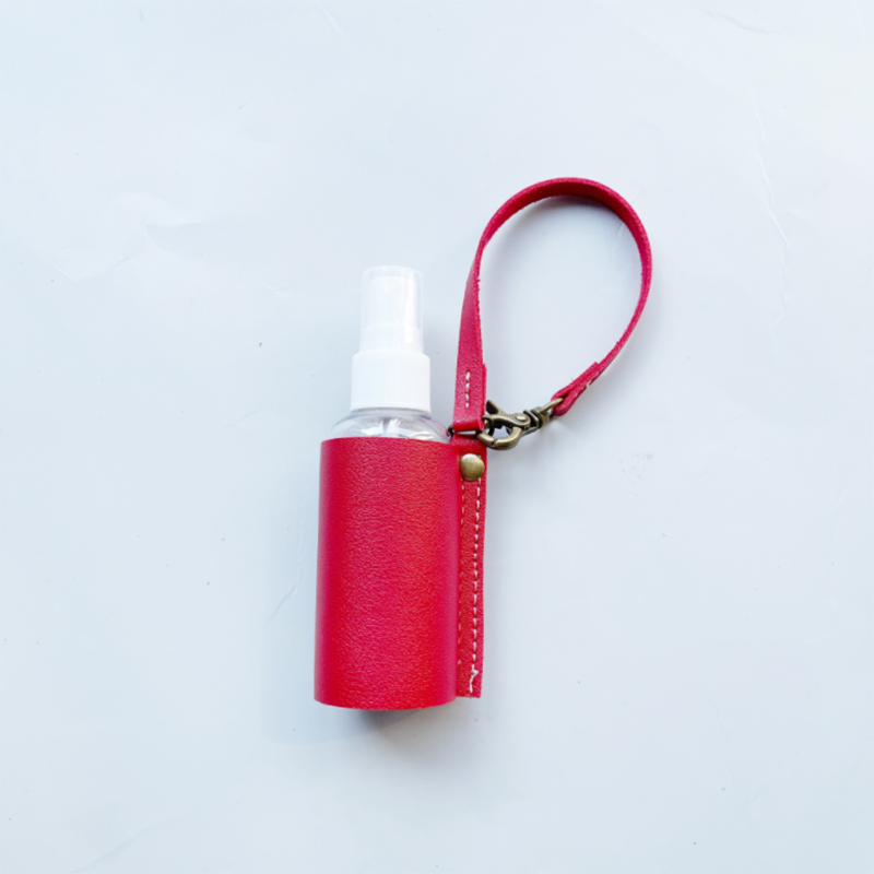 LLavero de Gel hidroalcohólico, funda desinfectante de manos, minibotella de Gel hidroalcohólico portátil, Funda de cuero, llavero de salud, 1 ud.: red