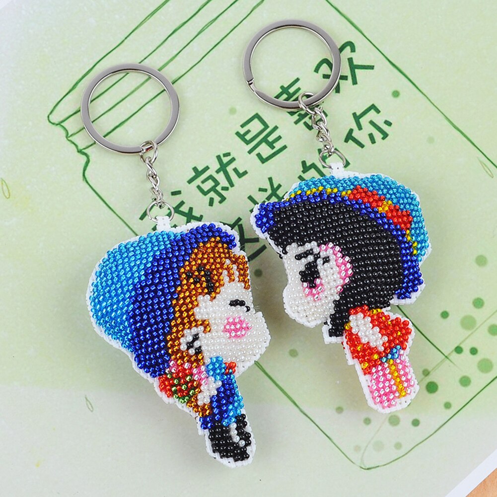 Llaveros con todas las cuentas DIY con dibujos animados de niña y niño, bordado de punto de cruz, bolso hecho a mano para mujer, colgante, joyería, llavero, 2 uds.
