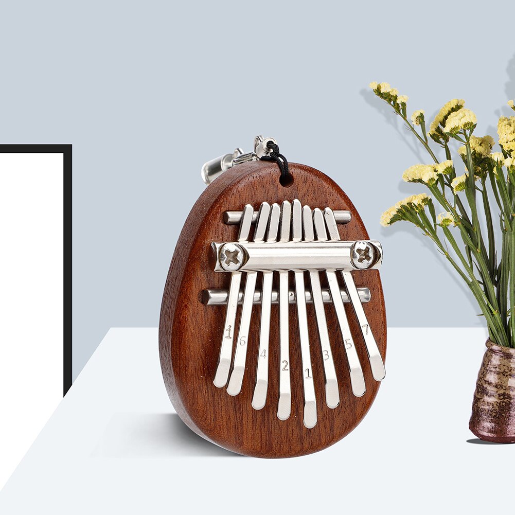 Mini Piano de pulgar de 8 teclas, instrumento Musical de Marimba, dedo de África, colgante,