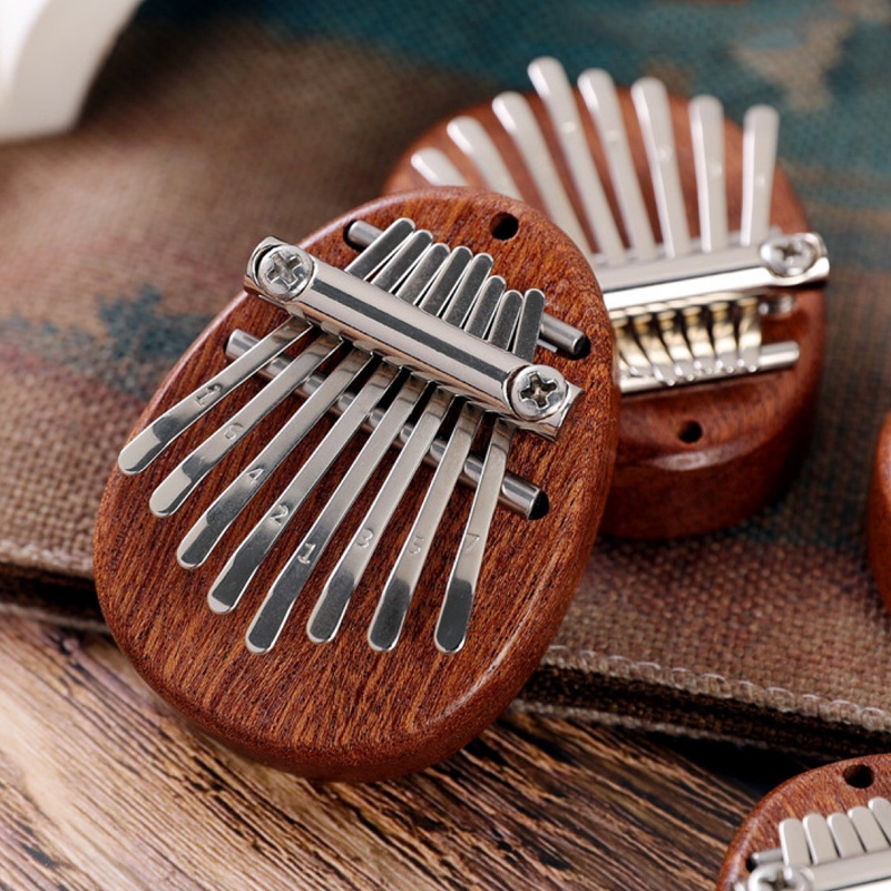 Mini Kalimba à 8 touches, piano à pouces, piano à doigts exquis, Marimba portable, pendentif musical, clavier à 8 touches