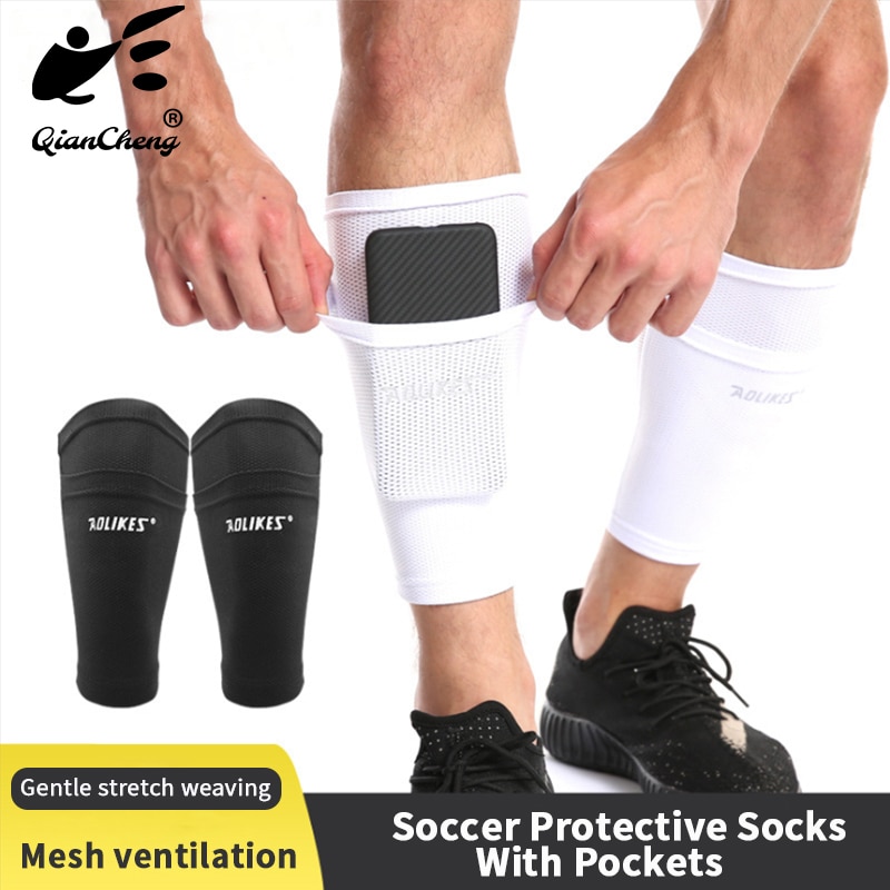 1 par fodbold beskyttelsessokker med lommer fodbold skinnebeskyttelsespuder benærmer understøtter børn voksne kalv beskyttelsessokker