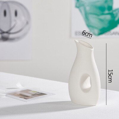 Hvid porcelæn blomstervase stue dekoration figurer håndværk håndværk tørre blomster planter holder uregelmæssig vase: Q
