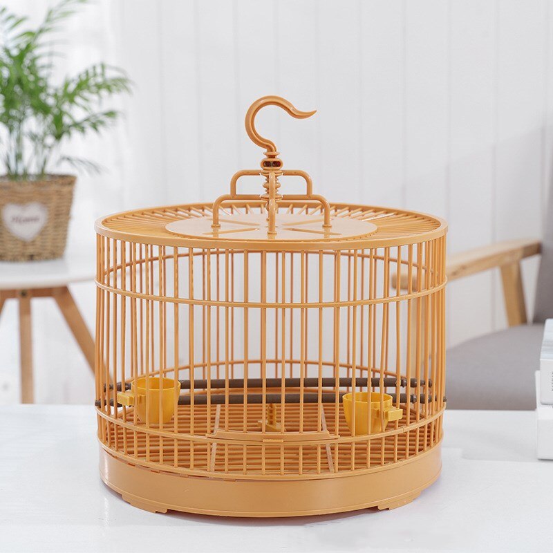 Jaula redonda de plástico para pájaros, jaula Retro Para loros con alimentador, desmontable y transpirable, suministros de cría
