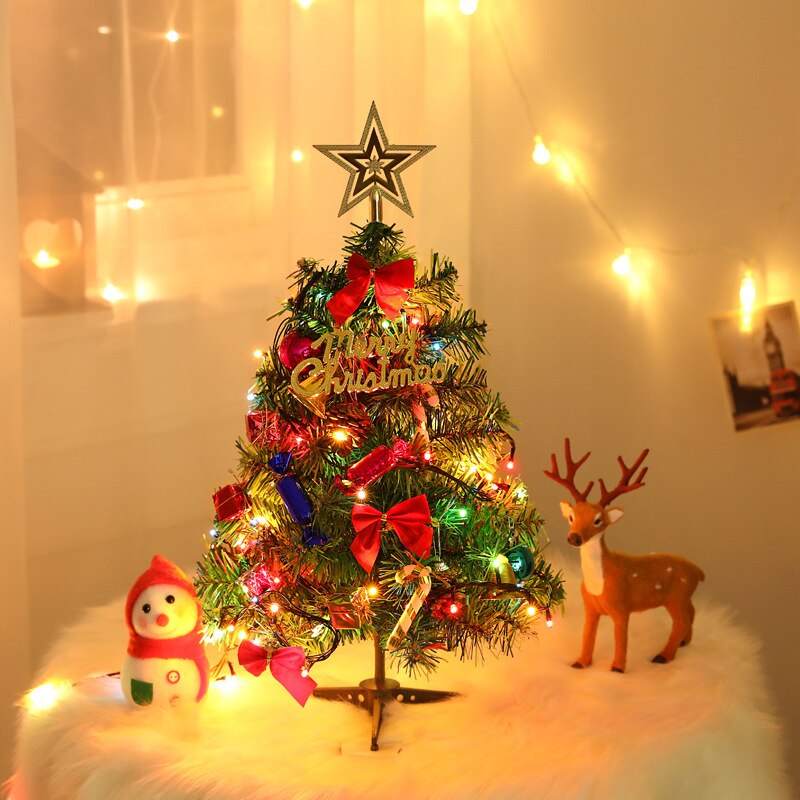 Mini kerstboom met lampjes kleine accessoires strik belletjes dennenappel kersttafel jaarversiering