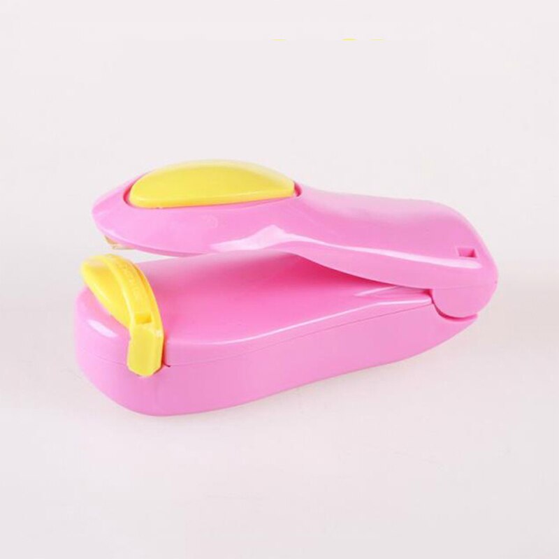 1pc bärbara hushålls mini värmeförseglingsmaskin förseglare impuls plast polypåse inte batteri hem värmeförseglingspaket återförslutare: Rosa