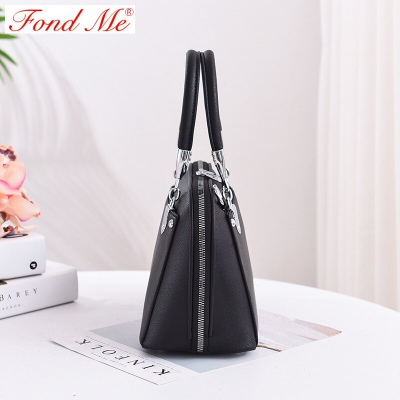 Ensfarget bærbar skulderveske med skulderkors