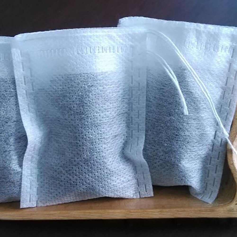 100 st engångs tepåse non-woven tyg tom doftande tepåsar värmeförsegling ört lös tefilter påse kökstillbehör