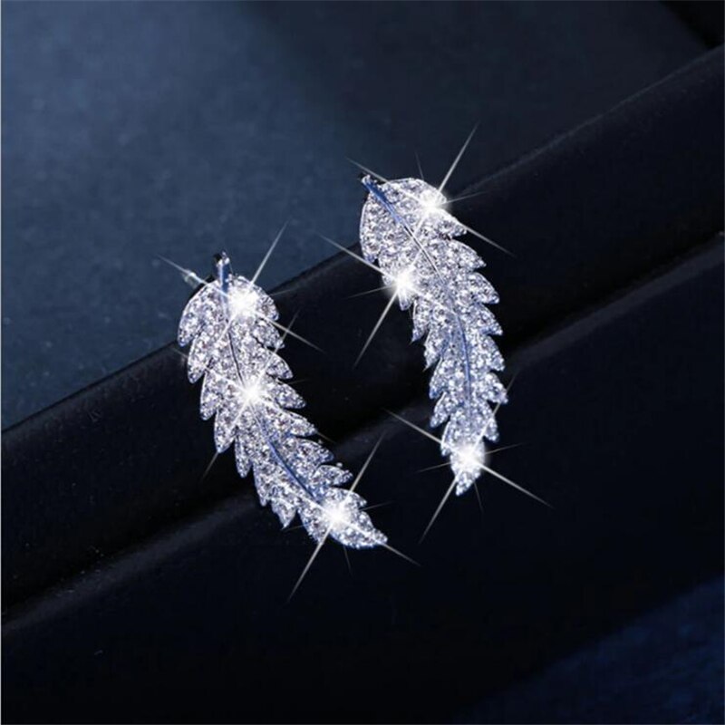 1 par smukke fjerøreklatrere manchetøreringe krystal diamonden blade klynge bryllup øreringe til kvinder