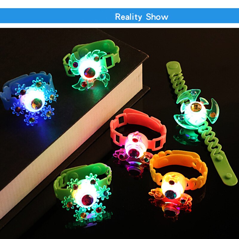 Cinturino per bambini con luci a LED luminose bagliore nel buio polsino rotante manuale Flash giroscopio giocattolo di plastica Fidget trottola 0