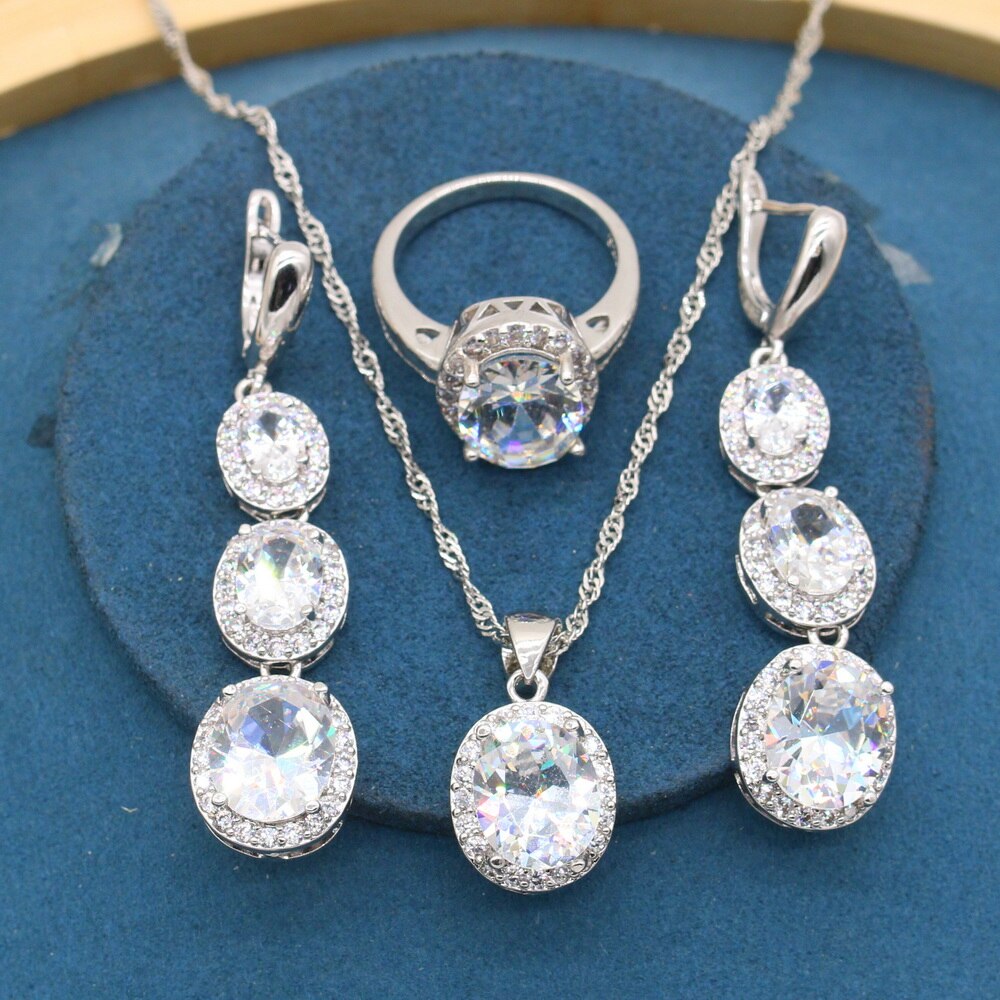 Set di gioielli classici Color argento con zirconi bianchi per bracciale da donna orecchini lunghi collana con ciondolo anello regalo: 3PCS / 7