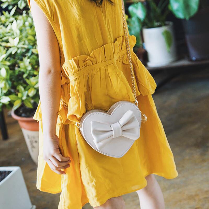 Baby Girls Cute Bow Handbags Heart Shaped Shoulder Bag Solid Color Crossbody Bags Small Purse PU Leather