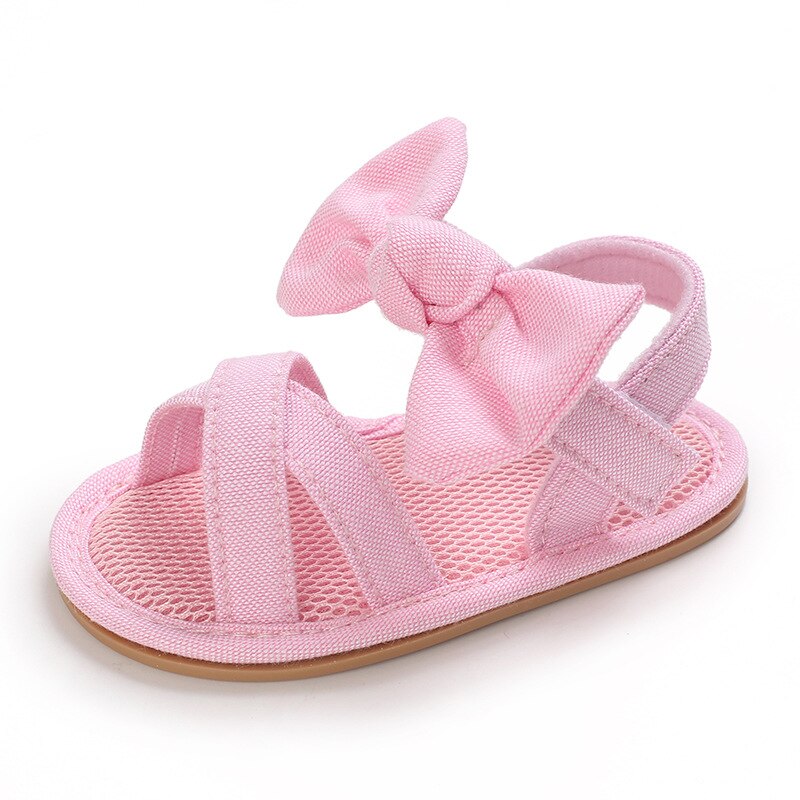 Scarpe da bambina per bambini sandali piatti per bambini sandali suola in gomma morbida Premium antiscivolo fiocco estivo punta d'onda pizzo scarpe da passeggio