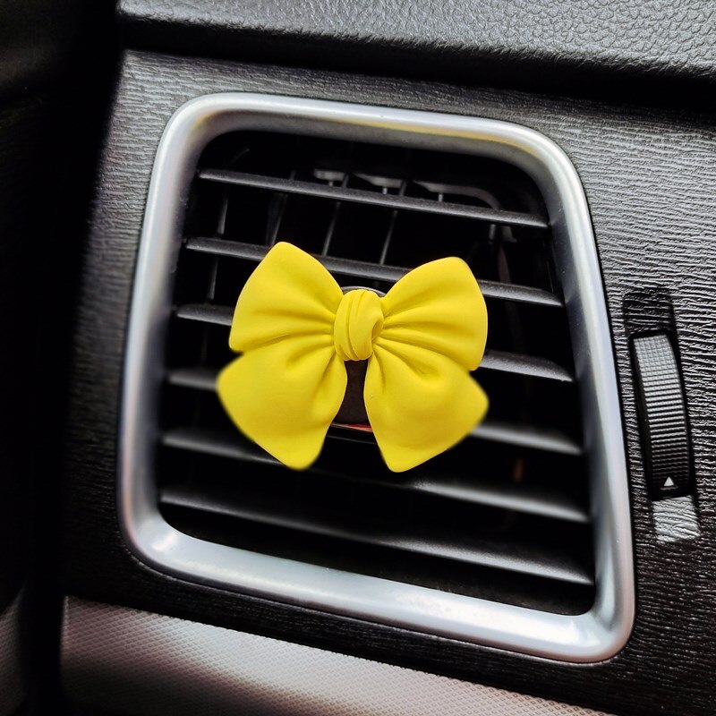 Cute Bow-knot Car Accessories Interior Woman Perfume Clip Car Air Freshener Air Vent Clip Cartoon Bow-knot Girls Decoration: Yellow