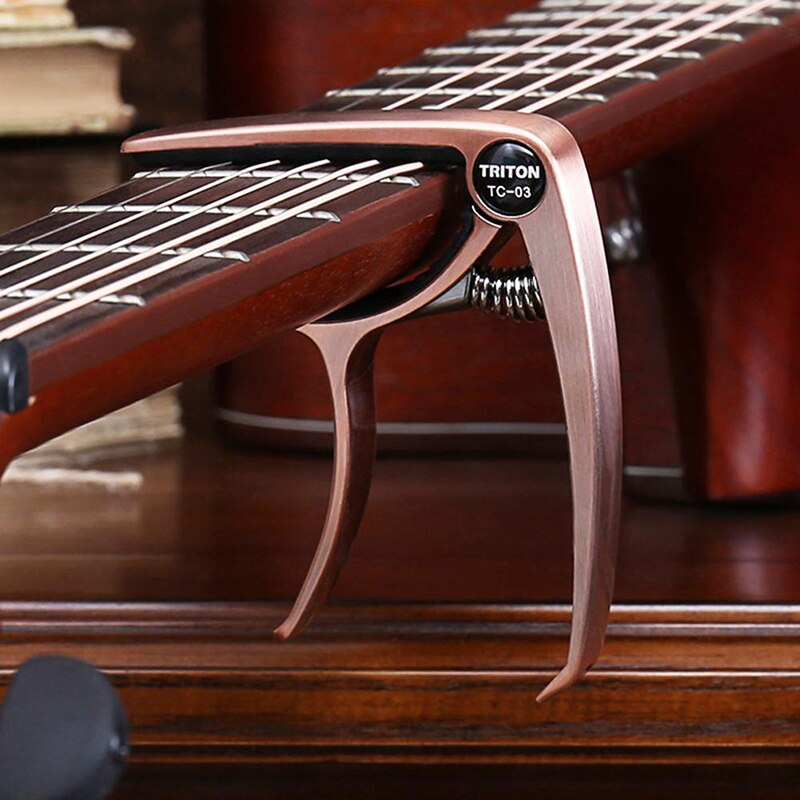Accesorios universales para guitarra Capo, llave de cambio rápido, Metal de aleación de aluminio, cejilla para guitarra clásica acústica, piezas para guitarra: Red copper