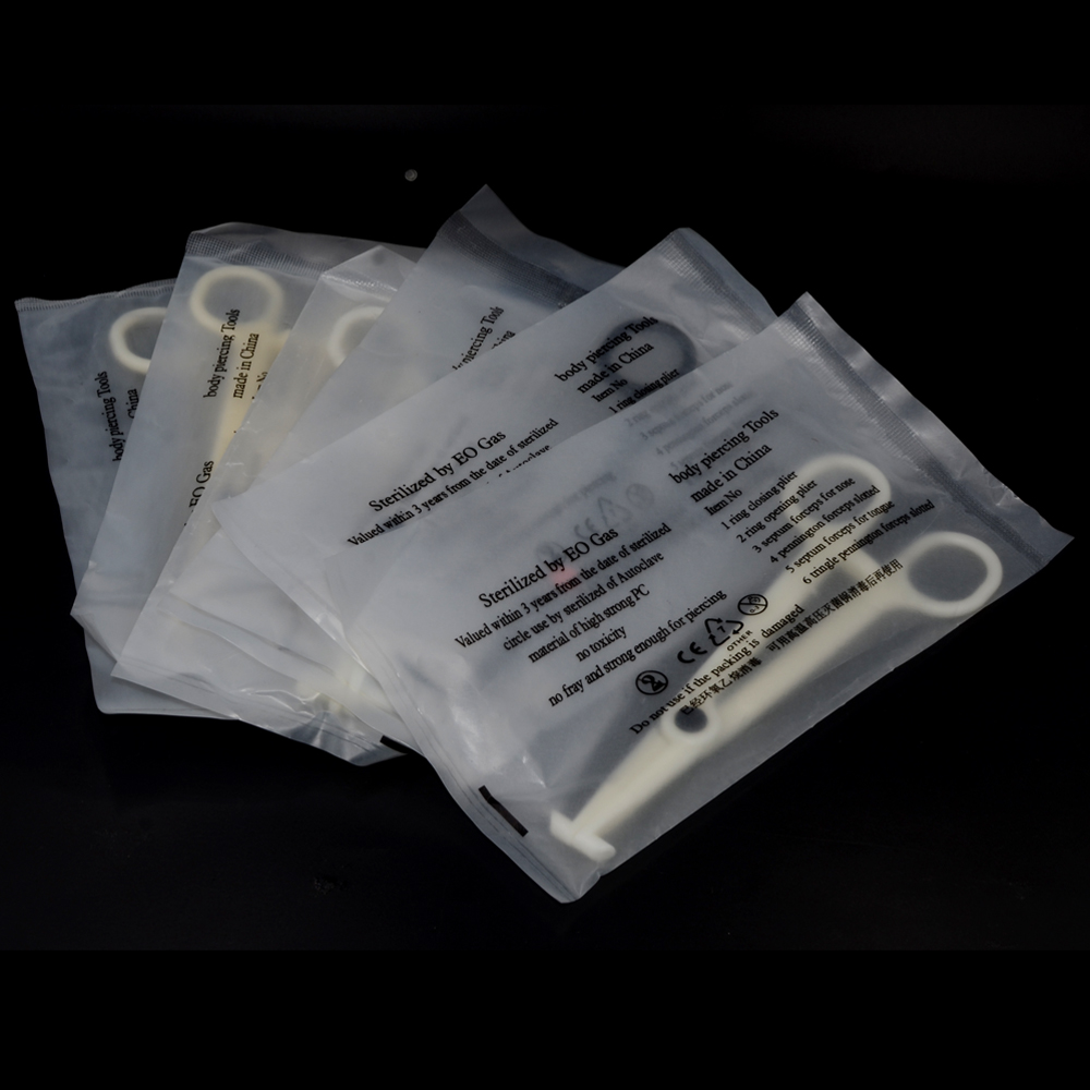 Alicates desechables de abrazadera de apertura/cierre esterilizados por EO Gas PC, pinzas para oreja, nariz, labio, vientre, herramientas para perforación corporal, 1 ud.
