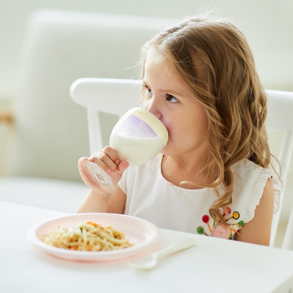 Taza de leche para el desayuno para niños, vaso para la alimentación de agua con forma de copa y botella de lactancia a prueba de fugas de 150ml: Yellow