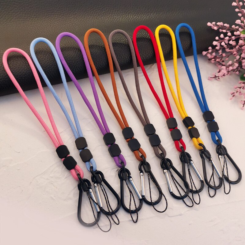Cordón ajustable para teléfono móvil, cuerda corta tejida a mano, colgante para muñeca, funda universal antipérdida que combina con todo