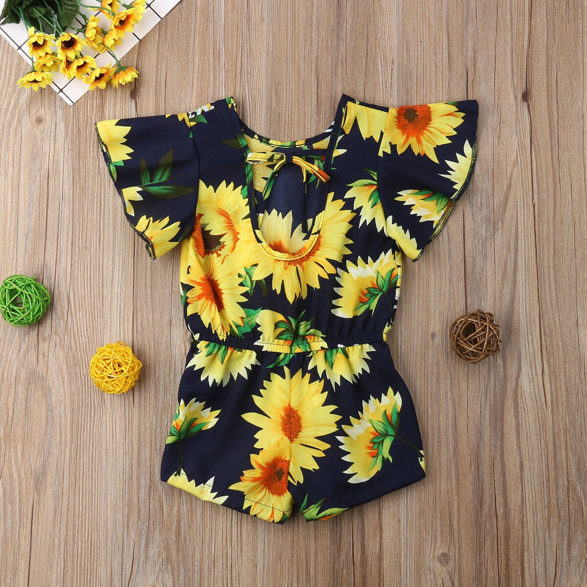 Nieuwe zomer schattige baby meisjes romper ruches korte mouwen bloemenprint jumpsuits 6m-4y