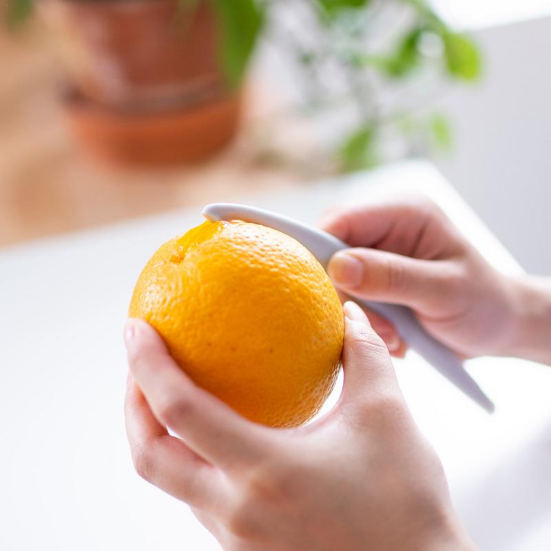 Sitrushedelmät appelsiini sitrushedelmien kuoriimet innovatiivinen hedelmä muovi höyläystyökalu avoin greippi artefakti leikkaus hedelmät keittiö vempain