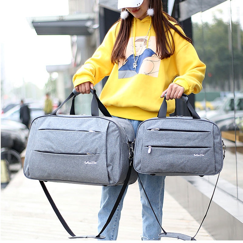 Luggage travel bags Waterproof canvas men women big bag on wheels man shoulder duffel Bag Black Blue carry on cabin luggage ZL32