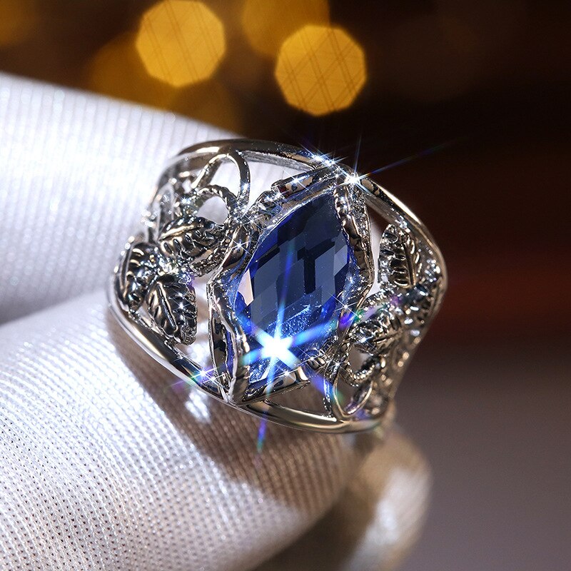Luxus Weiblichen Blauen Kristall Ring Jahrgang Silber Farbe Große Hochzeit Ringe Für Frauen modisch Hohl Blume Zirkon Engagement Ring