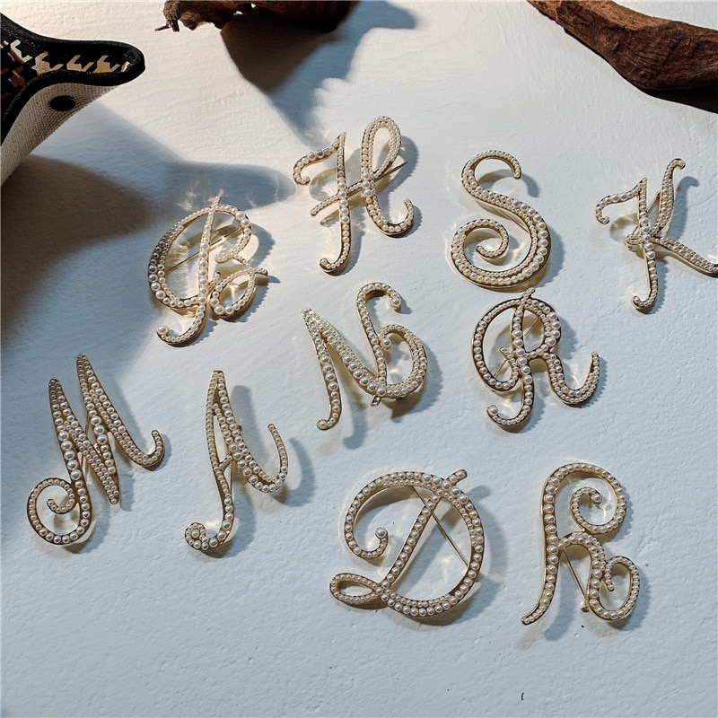 Koreaanse broches, corsages, luxe sieraden, parels, engelse letters, vesten, reversspeldjes, damesaccessoires