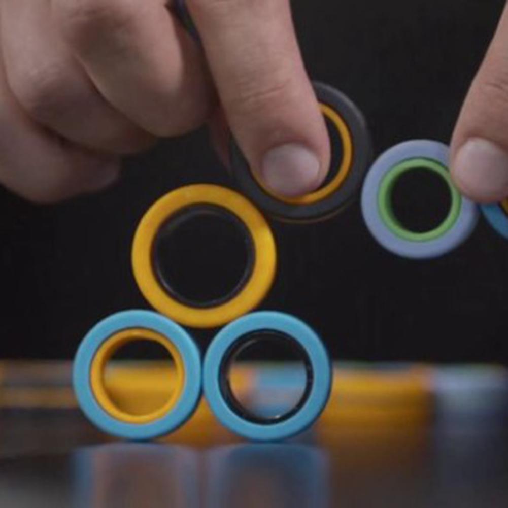 Magnetisk ring legetøj farverigt holdbart unzip armbånd magisk legetøj til venner, der samler festivaler præstation