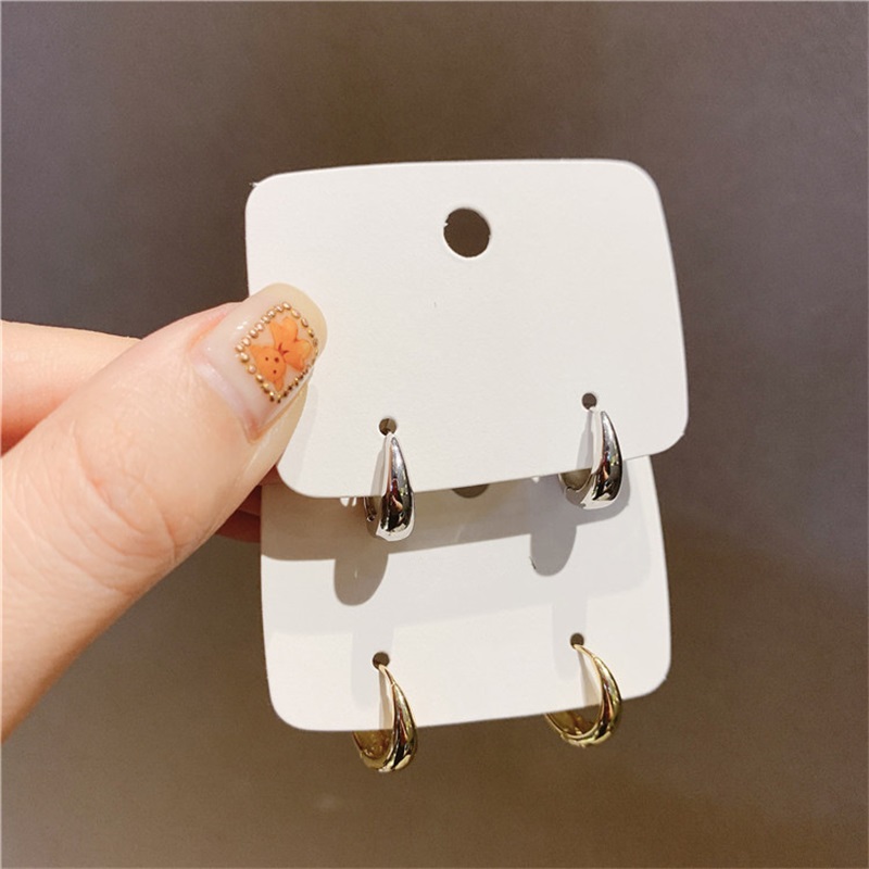 Huitan-pendientes de aro de Metal a la para mujer, accesorios sencillos y versátiles para uso diario, joyería llamativa para chicas jóvenes