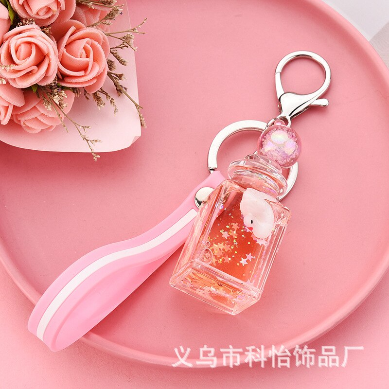 Shaking Voice Network Red Floating Square Milk Bottle Little Swan Keychain Oiling Quicksand Bag Car Pendant: Lemon Yellow