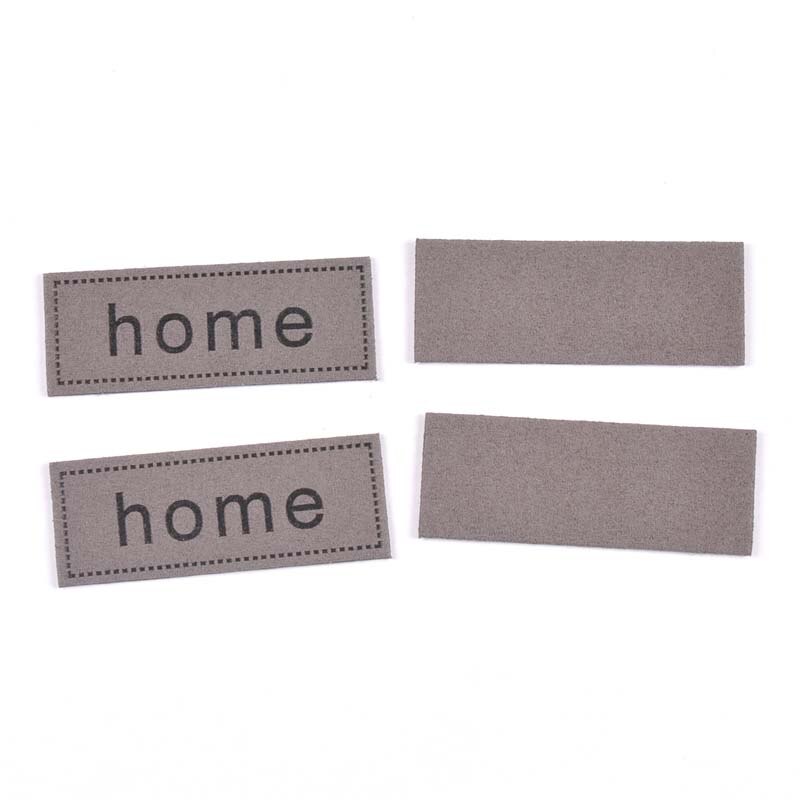 10 st hemmönster handgjorda klädmärken präglade taggar diy flagg etikett för plaggsömtillbehör 25 x 65mm: Grå