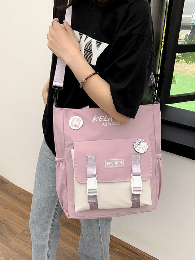 Søt jenteskulderveske skoleveske kvinnelig ins universitetsstudent lerretsveske crossbody stor kapasitet bokveske messengerveske