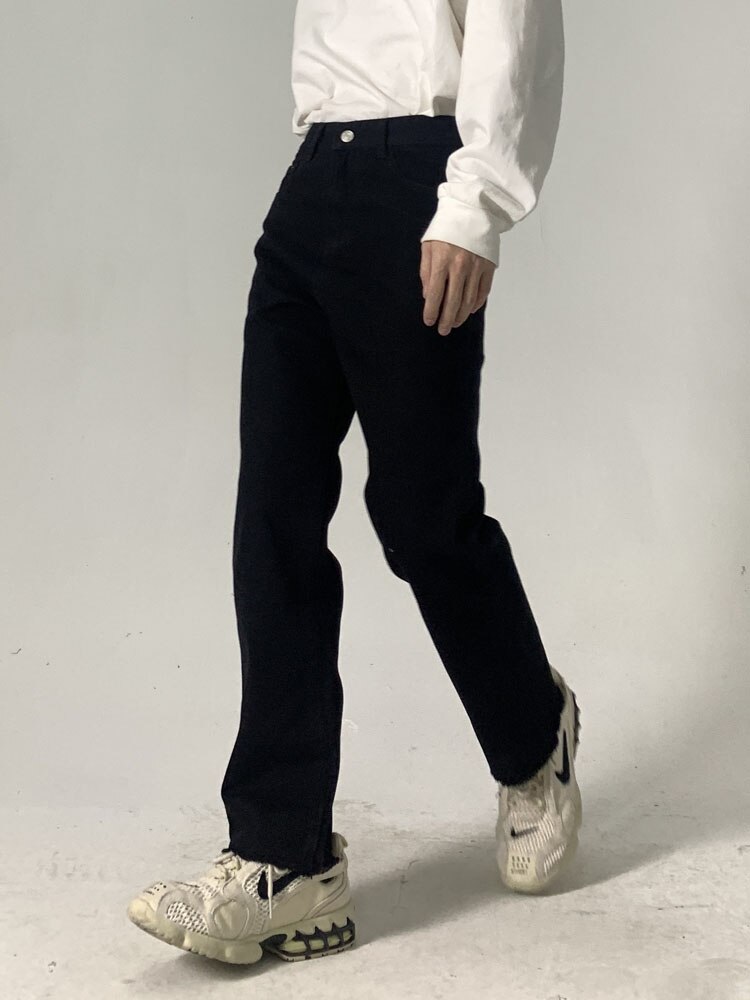 Pantalones vaqueros con dobladillo roto para hombre, ropa de calle de estilo coreano japonés, informal, Hip Hop, Vintage, para pareja