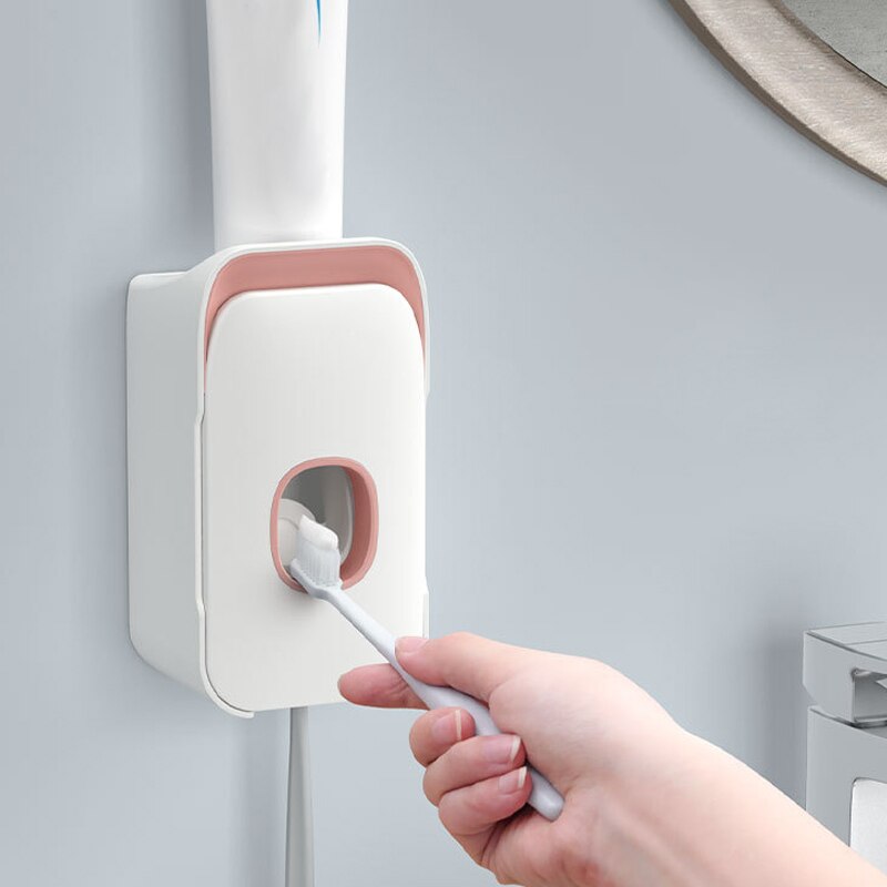 2- i -1 automatisk tandpasta dispenser tandbørsteholder suge vægmonteret håndfri tandpasta squeezer: Lyserød