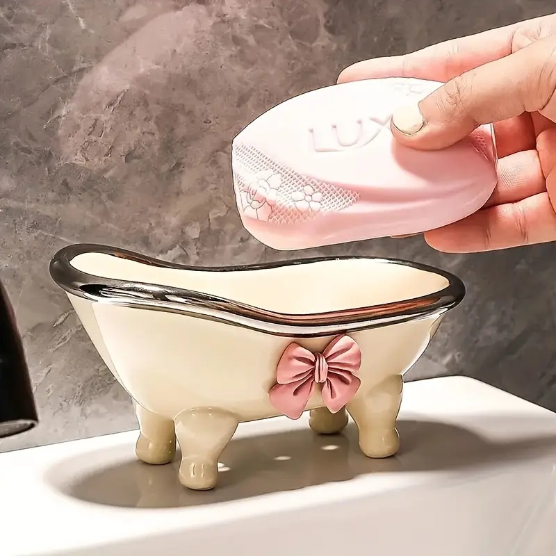 1 Stück niedliche Badezimmer-Seifenschale aus Kunststoff – Seifenhalter mit Schleife und kreativer Entwässerung – Badezimmer-Accessoires-Tablett