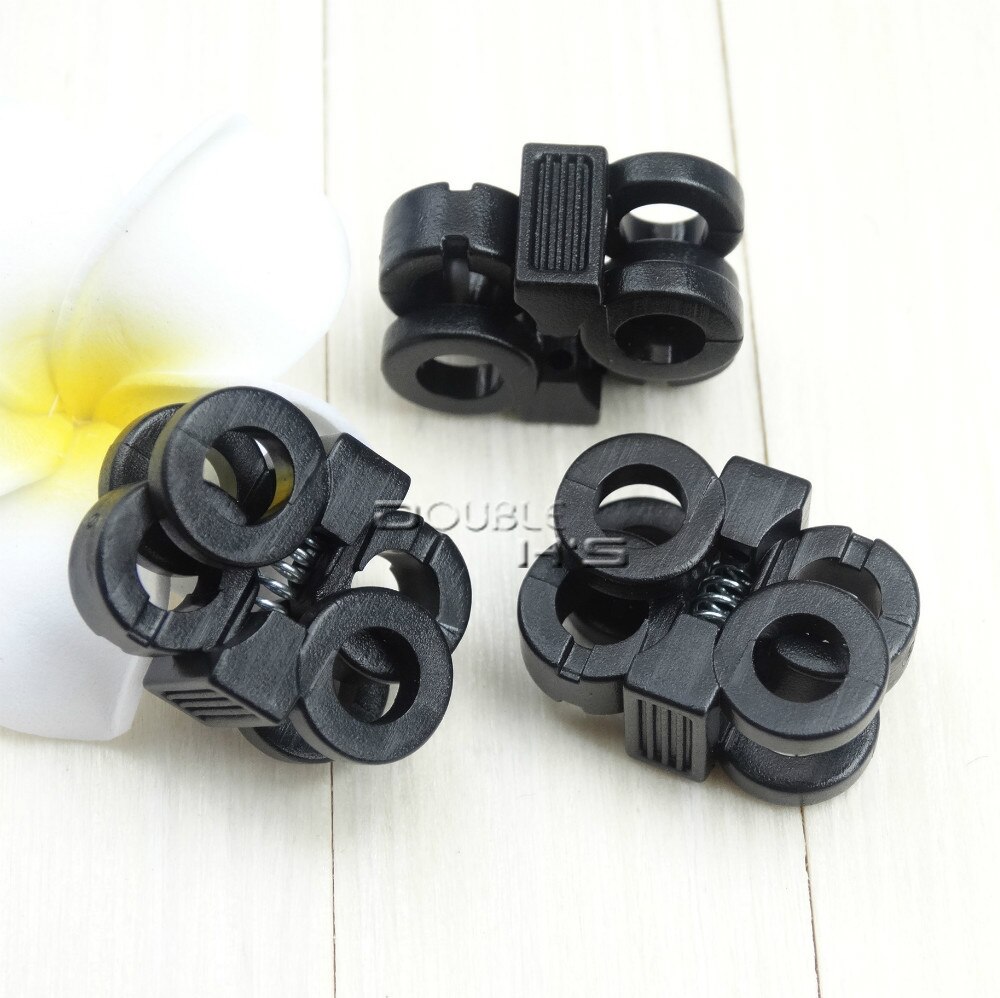 10 stk/parti 2 hull 5.7mm skolisser plastspenner snorlåser vippestopper svart