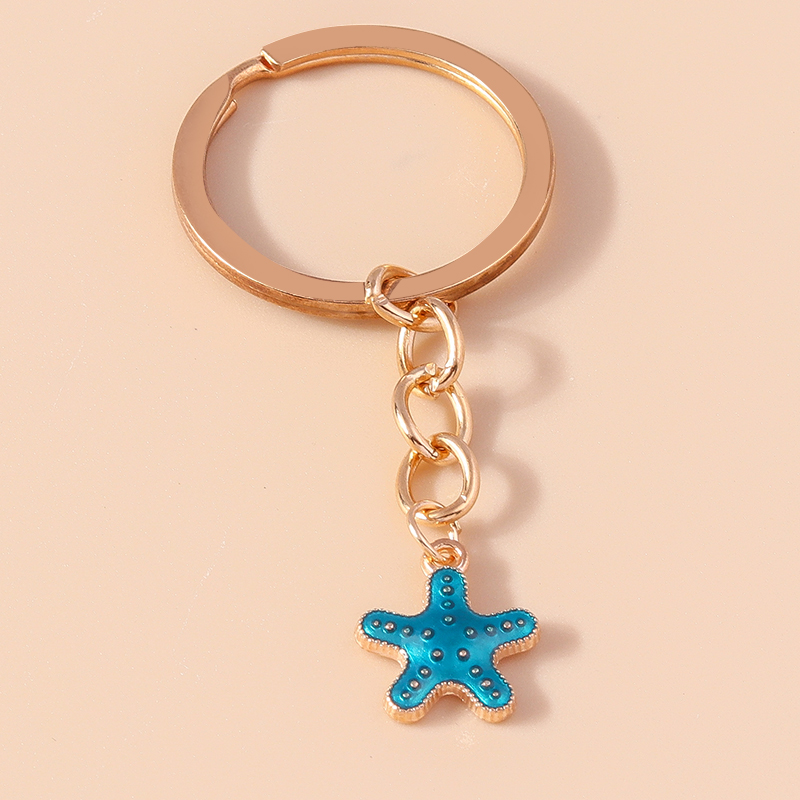 Bonito llavero esmaltado con forma de estrella y lentejuelas, dijes para mujer y niña, llavero con colgantes, llavero de coche, bolso, decoración, de joyería: Violeta