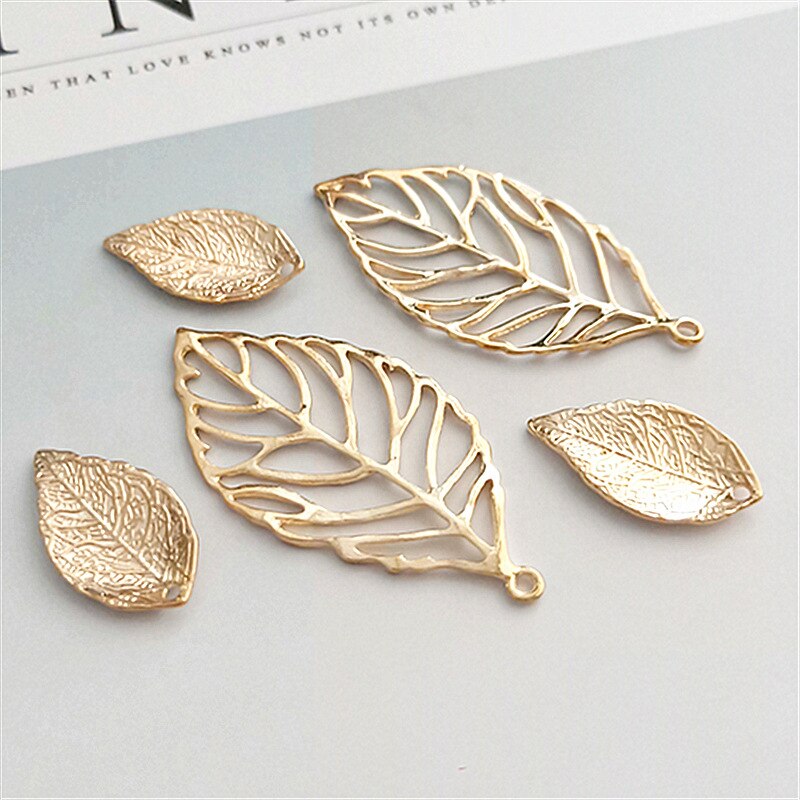 10 stk/lot legering bladgull anheng knapper ornamenter smykker øredobber choker hår gjør-det-selv smykketilbehør håndlaget