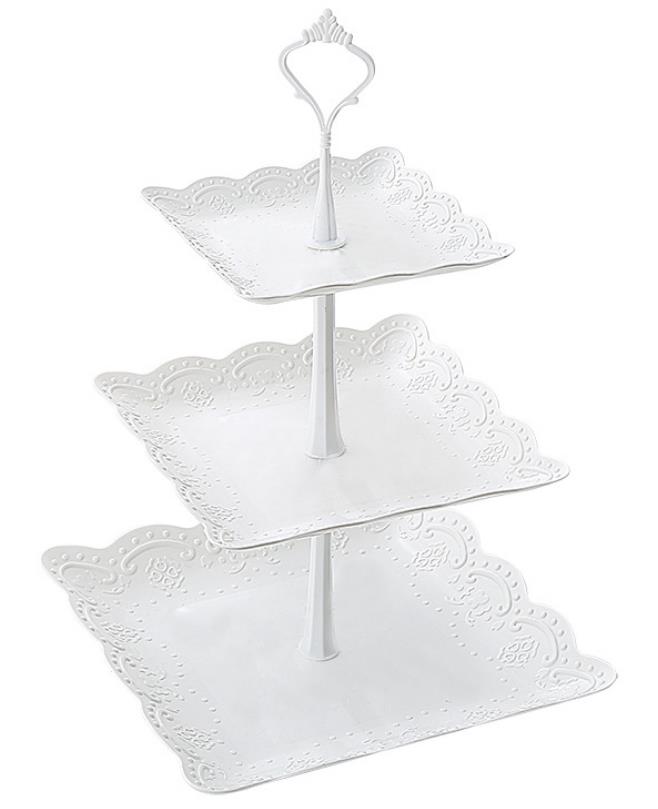 Hjem husstand 3 etager kagestativ og frugt dessert brød tallerken eftermiddagste fest servering fad