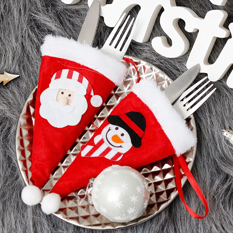 Kerstversiering kerstmuts dao cha tao mes en vork tas kersttafel feestdecoratie