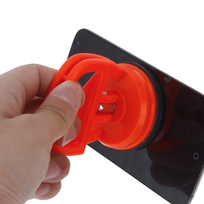 Orange röd sugkupa avlägsnande av avlägsnande av glashandtag