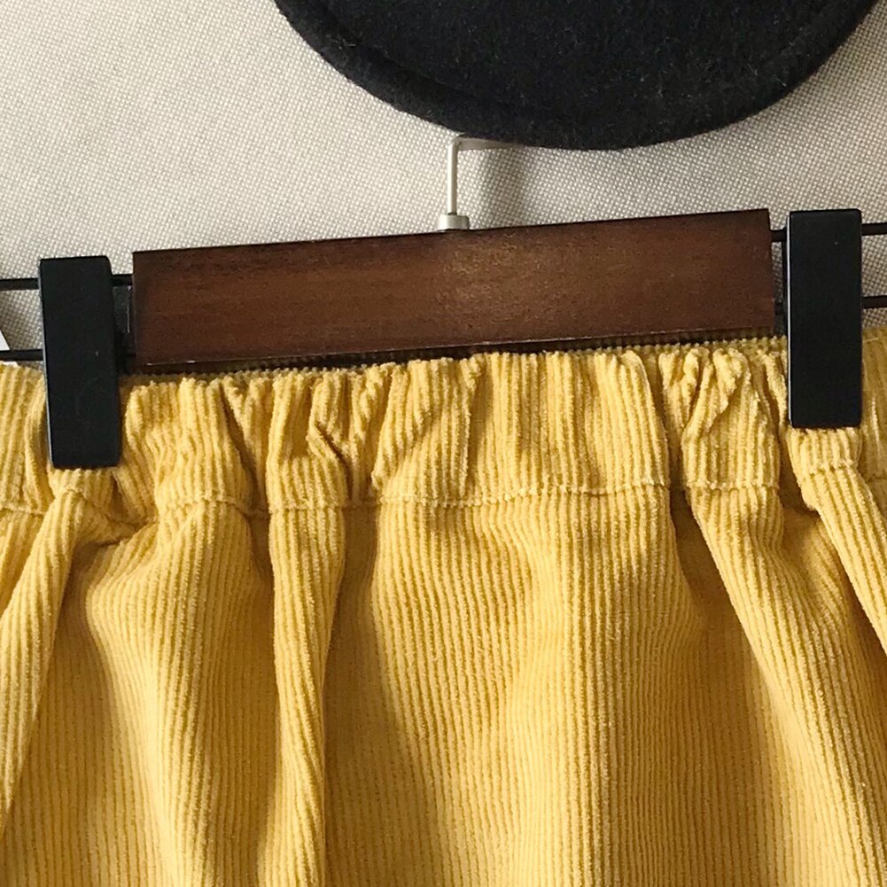Flickor söta fickkjol paket höftkjol vårvinter kort kjol festkjol härliga småbarnskläder
