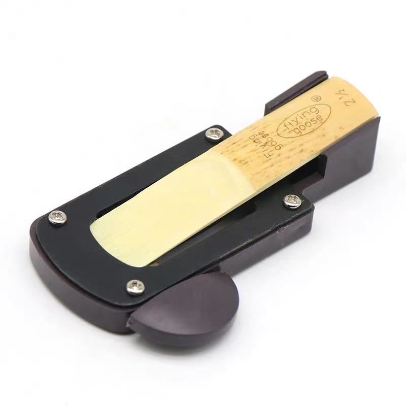 Shanghai flyinggoose alto/tenori/sopraano saksfoni ruoko trimmerit & klarinetti kaislat trimmerit ruokot cutter-musta
