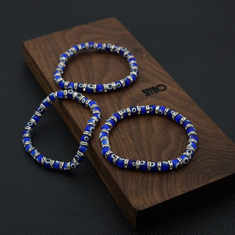 Classic Blue Evil Eyes rotonda perle di vetro braccialetto che desidera corda elastica braccialetto a catena per il regalo dei monili di modo delle donne